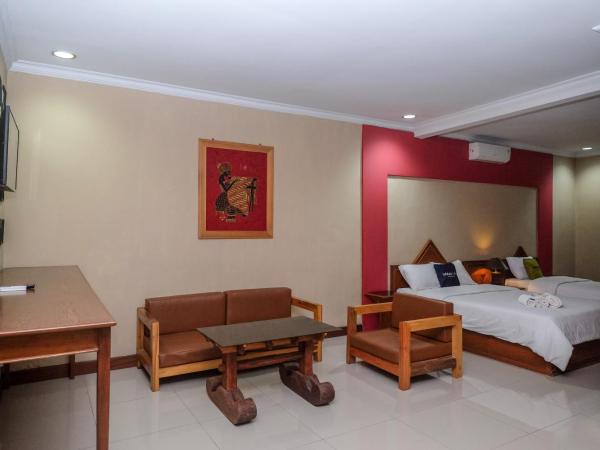 Urbanview Hotel Syariah Wisnugraha by RedDoorz : photo 7 de la chambre chambre familiale deluxe