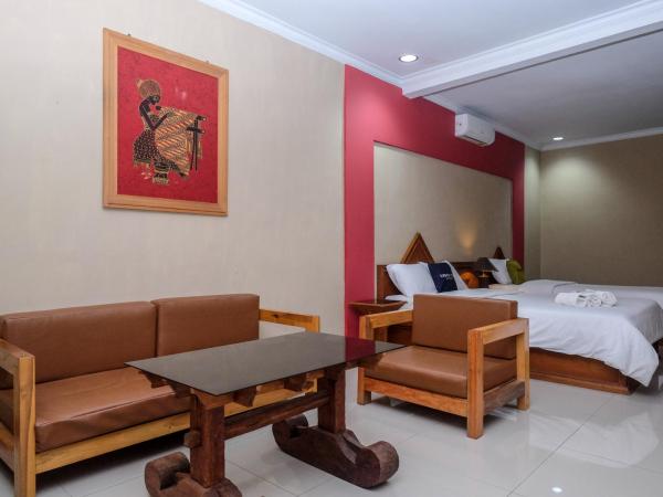 Urbanview Hotel Syariah Wisnugraha by RedDoorz : photo 10 de la chambre chambre familiale deluxe