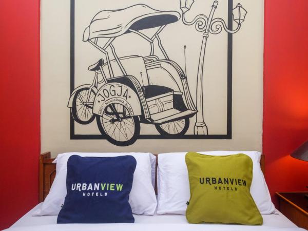 Urbanview Hotel Syariah Wisnugraha by RedDoorz : photo 1 de la chambre chambre double standard