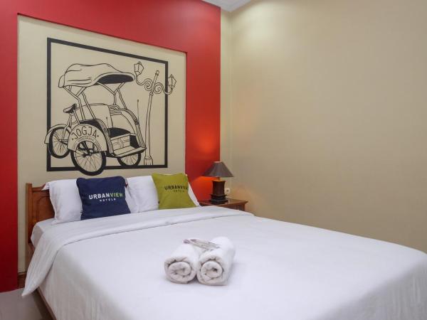 Urbanview Hotel Syariah Wisnugraha by RedDoorz : photo 7 de la chambre chambre double standard