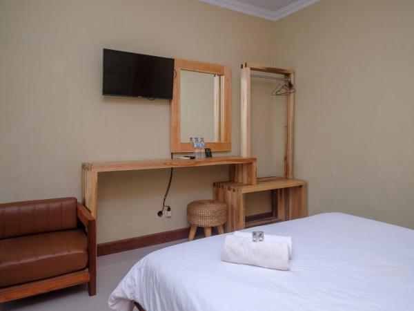 Urbanview Hotel Syariah Wisnugraha by RedDoorz : photo 5 de la chambre chambre double standard