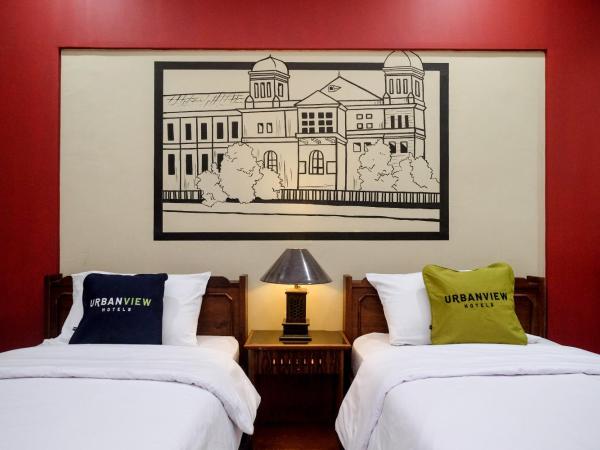 Urbanview Hotel Syariah Wisnugraha by RedDoorz : photo 2 de la chambre chambre lits jumeaux deluxe