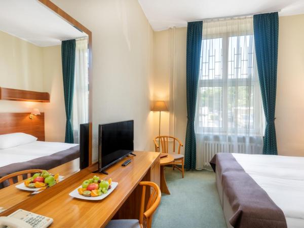 Hotel Millennium : photo 2 de la chambre chambre double ou lits jumeaux - accessible aux personnes à mobilité réduite