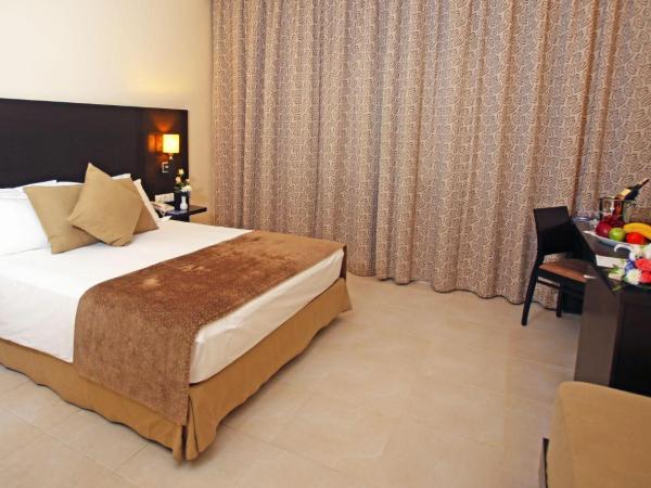 Labranda Targa Aqua Parc : photo 4 de la chambre chambre double standard - vue sur jardin