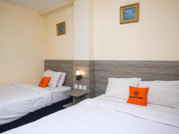 Koolkost near Stadion Maguwoharjo : photo 1 de la chambre chambre lits jumeaux