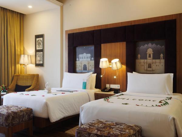 Le Meridien Jaipur Resort & Spa : photo 1 de la chambre chambre supérieure avec lits jumeaux (20 % de réduction sur la nourriture et les boissons sans alcool, 20 % de réduction au spa, 1 achat 1 pour 1 sur certaines marques au bar madeira entre 16h00 et 22h00) - vue sur jardin