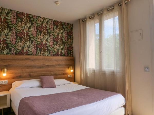 Lou Riou Village Vacances : photo 2 de la chambre chambre quadruple confort
