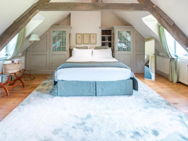 Le Clos de Grâce : photo 10 de la chambre suite junior mansardée - vue sur jardin