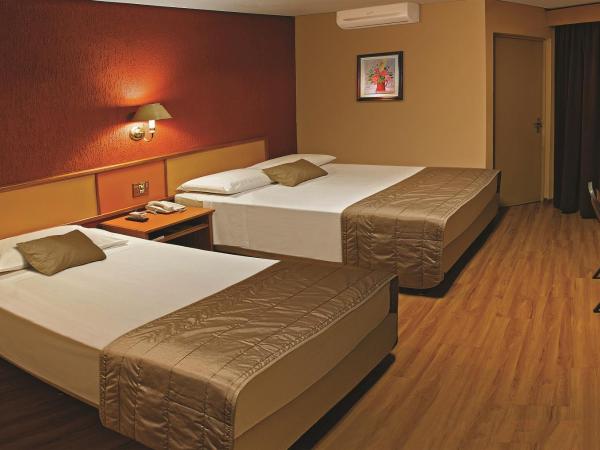 Lira Hotel : photo 2 de la chambre chambre triple supérieure avec 1 lit double