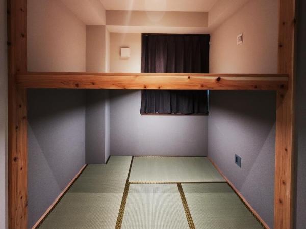 2023年6月開業 サカエ ゲストハウス : photo 2 de la chambre chambre triple avec toilettes communes