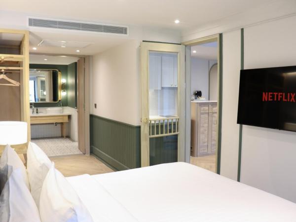 The Quarter Chaophraya by UHG : photo 3 de la chambre suite quarter premier 1 chambre avec lit king-size