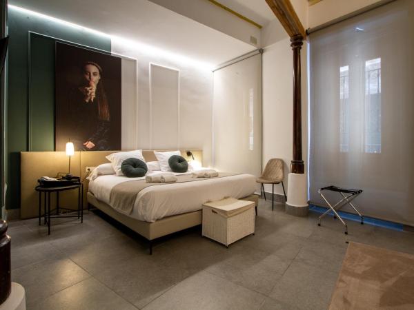 Les Monges Palace Boutique : photo 1 de la chambre chambre triple - accessible aux personnes à mobilité réduite