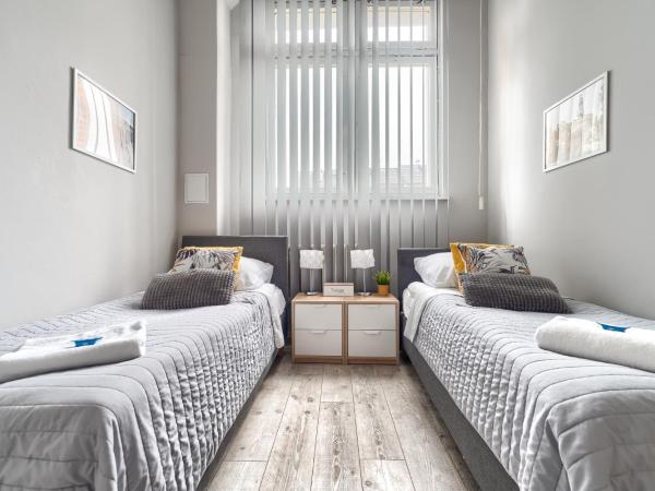 Stawa Apart Hostel : photo 2 de la chambre pokój z 2 łóżkami pojedyńczymi i wspólną łazienką na korytarzu