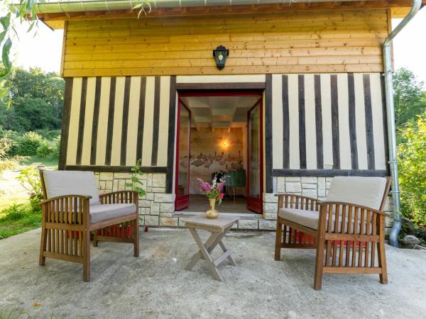 L'Herbe Haute : photo 7 de la chambre cottage - vue sur jardin