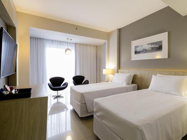 Promenade Link Stay Barra da Tijuca : photo 1 de la chambre chambre lits jumeaux deluxe