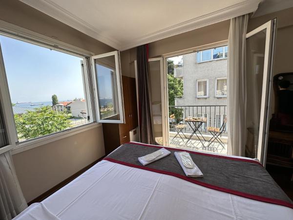 Queen Seagull Boutique Hotel : photo 8 de la chambre chambre lit king-size avec balcon