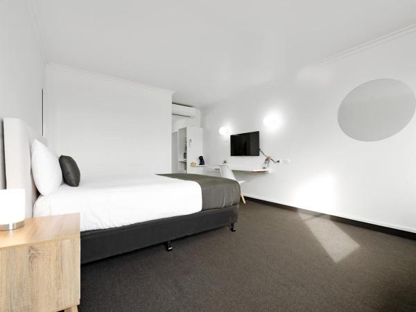 Coach House Launceston : photo 2 de la chambre chambre lit queen-size deluxe