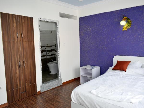 Mount Star Homestay : photo 2 de la chambre chambre lits jumeaux avec salle de bains privative