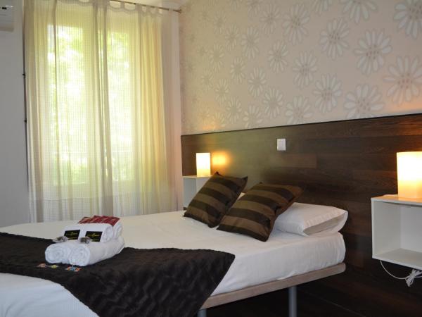 Hostal El Brezo : photo 5 de la chambre chambre double – vue sur ville