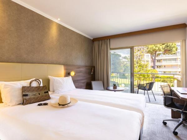 Luxotel Cannes : photo 2 de la chambre chambre lits jumeaux privilège avec vue sur jardin