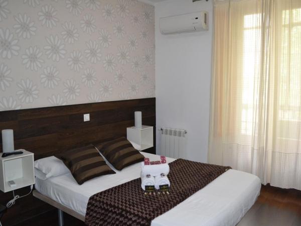 Hostal El Brezo : photo 3 de la chambre chambre double – vue sur ville