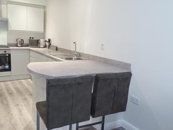 Cocoon @ International Inn + Apartments : photo 3 de la chambre appartement 3 chambres