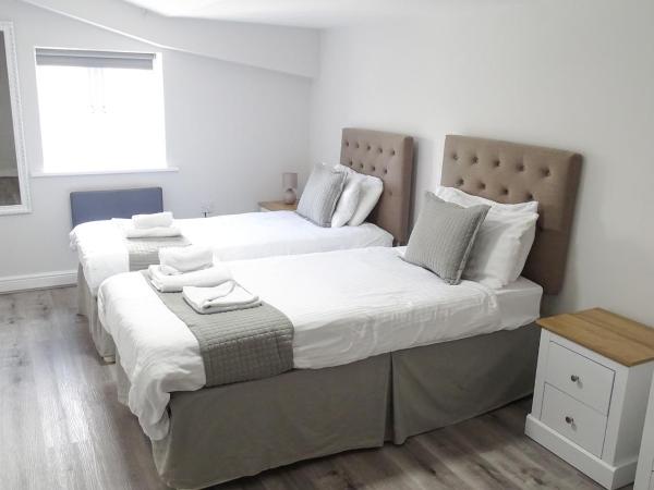 Cocoon @ International Inn + Apartments : photo 9 de la chambre appartement 3 chambres