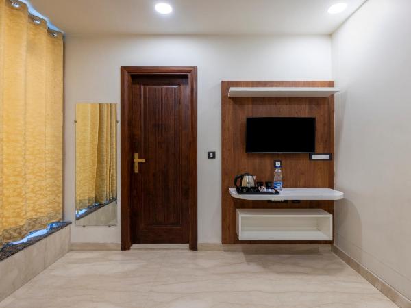 Treebo MVM Residency : photo 1 de la chambre chambre double deluxe