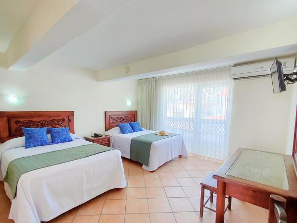 Hotel Rosita : photo 7 de la chambre chambre double standard avec 2 lits doubles