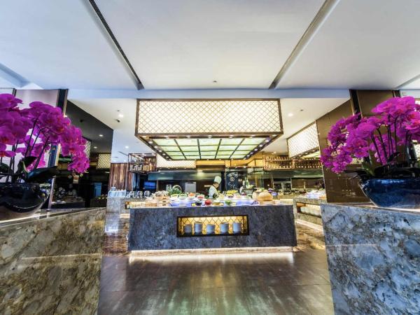 Marco Polo Parkside, Beijing : photo 2 de la chambre suite lit king-size supérieure avec accès au salon