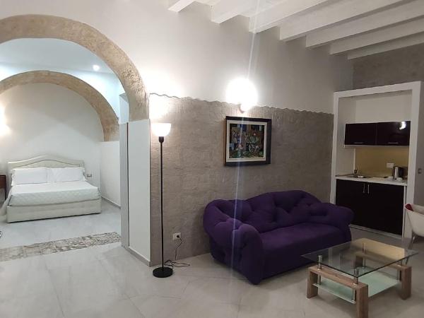 Hotel Ortigia Royal Suite : photo 1 de la chambre suite lit queen-size