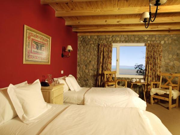 Blanca Patagonia Hostería Boutique y Cabañas : photo 3 de la chambre chambre triple