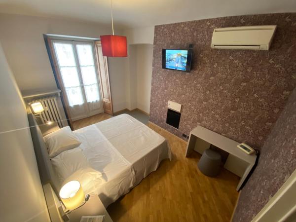 Artua'&Solferino : photo 1 de la chambre chambre triple