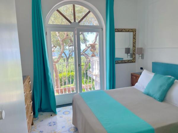 Villa Giovanna : photo 5 de la chambre chambre double ou lits jumeaux - vue sur mer