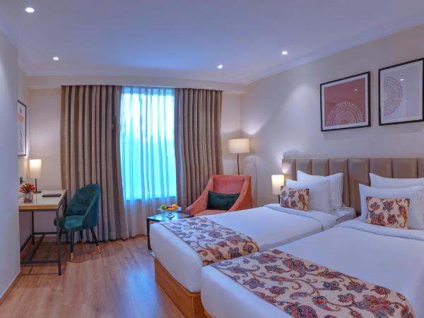 Royale Sarovar Portico Agra : photo 1 de la chambre deluxe room - 2 single beds