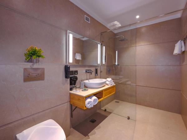 Royale Sarovar Portico Agra : photo 4 de la chambre deluxe room - 2 single beds