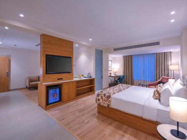 Royale Sarovar Portico Agra : photo 2 de la chambre suite - 1 double bed