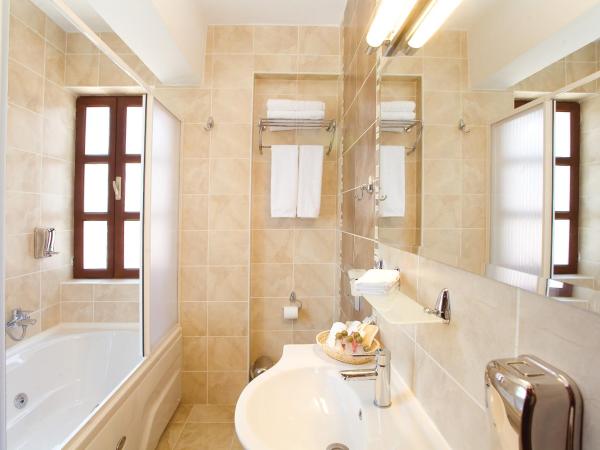 Cicerone Lodge Hotel : photo 4 de la chambre chambre lit king-size deluxe