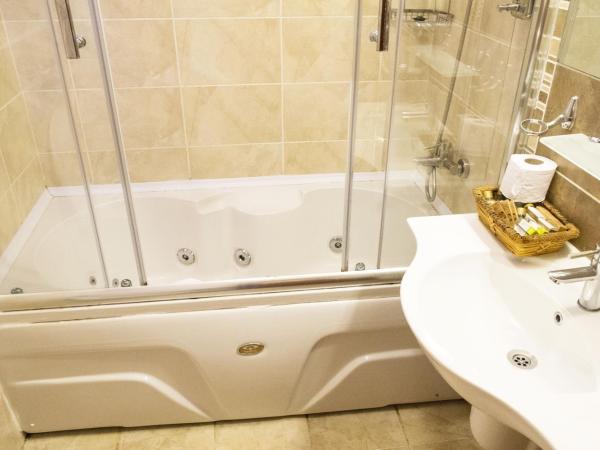 Cicerone Lodge Hotel : photo 9 de la chambre chambre lit king-size deluxe