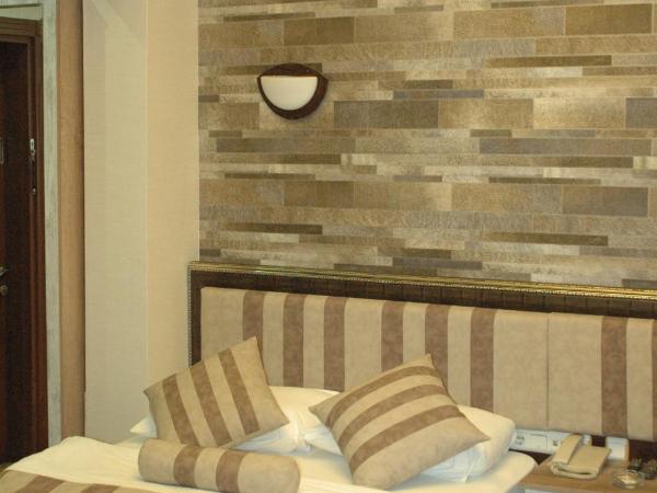 Konak Saray Hotel : photo 4 de la chambre chambre triple