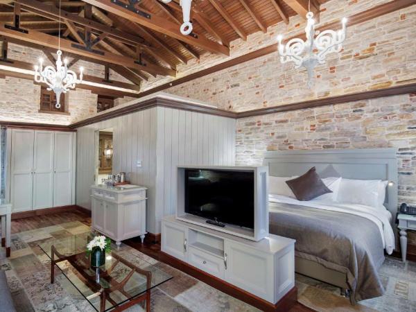 DoubleTree by Hilton Kusadasi : photo 5 de la chambre cottage lit king-size avec jardin privé