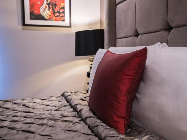 Square Townhouse : photo 2 de la chambre chambre lit king-size cozy