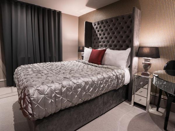 Square Townhouse : photo 1 de la chambre hébergement double douillet