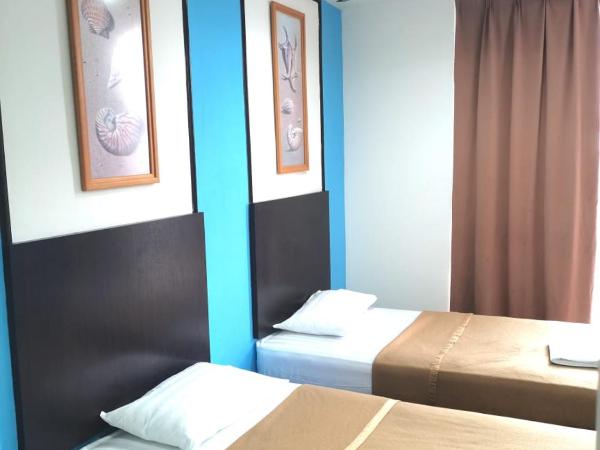 Shangg INN : photo 2 de la chambre chambre lits jumeaux deluxe