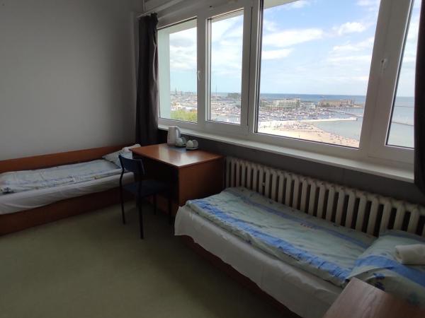 Hostel Mały Żagiel : photo 1 de la chambre chambre quadruple avec salle de bains privative