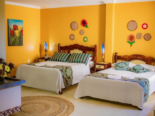 Castelo Beach Hotel : photo 3 de la chambre chambre quadruple avec vue latérale sur la mer