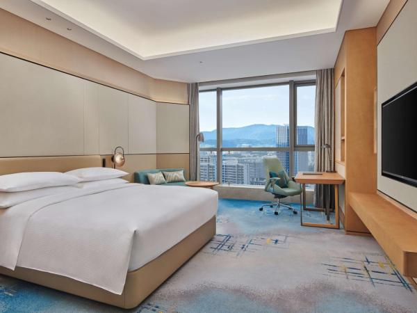 Doubletree By Hilton Suzhou Wuzhong : photo 6 de la chambre chambre lit king-size exéctive - accès au salon