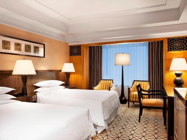 Sheraton Xi'an Hotel : photo 1 de la chambre chambre lits jumeaux deluxe - vue sur ville