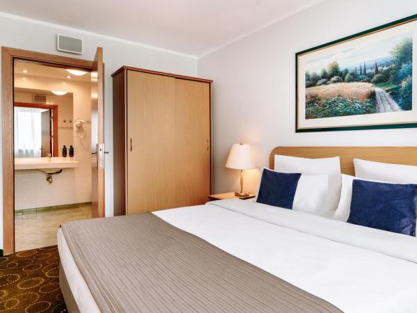 Hotel Mercure Toruń Centrum : photo 1 de la chambre suite deluxe avec canapé