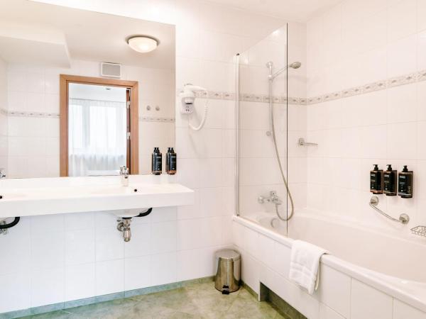 Hotel Mercure Toruń Centrum : photo 2 de la chambre suite deluxe avec canapé